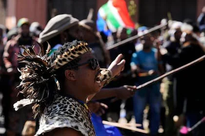 Protesters march against illegal immigration, in Johannesburg, South Africa, Tuesday, June 30, 2026. (AP Photo/Themba Hadebe)