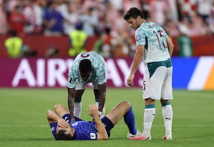 TORONTO, ONTARIO - JULY 02: Nelson Semedo #2 and Joao Neves #15 of Portugal console Duje Caleta-Car #5 of Croatia after the FIFA World Cup 2026 Round of 32 match between Portugal and Croatia at Toronto Stadium on July 02, 2026 in Toronto, Ontario.   Buda Mendes/Getty Images/AFP (Photo by Buda Mendes / GETTY IMAGES NORTH AMERICA / Getty Images via AFP)