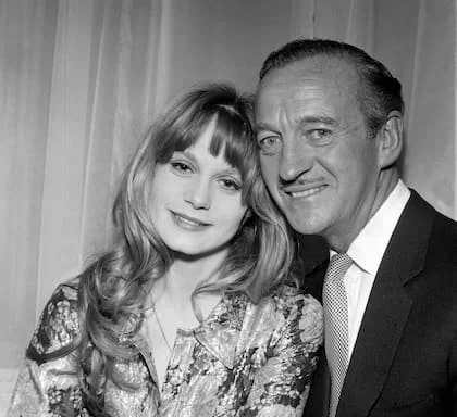 Con David Niven, en 1964